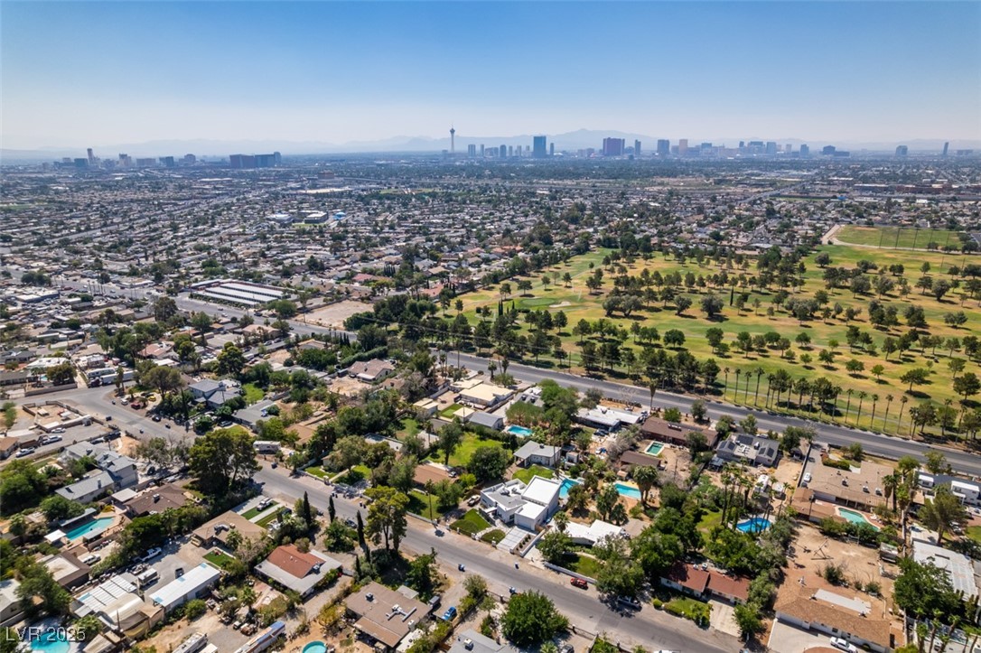 4087 Pleasant Road Las Vegas, NV 89108 - Photo 2 of 74 Aerial view of residential area with skyline