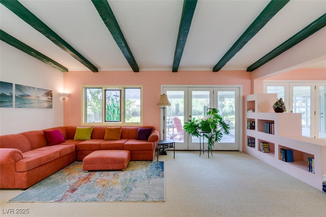 4087 Pleasant Road Las Vegas, NV 89108 - Photo 35 of 74 Carpeted living room featuring beamed ceiling