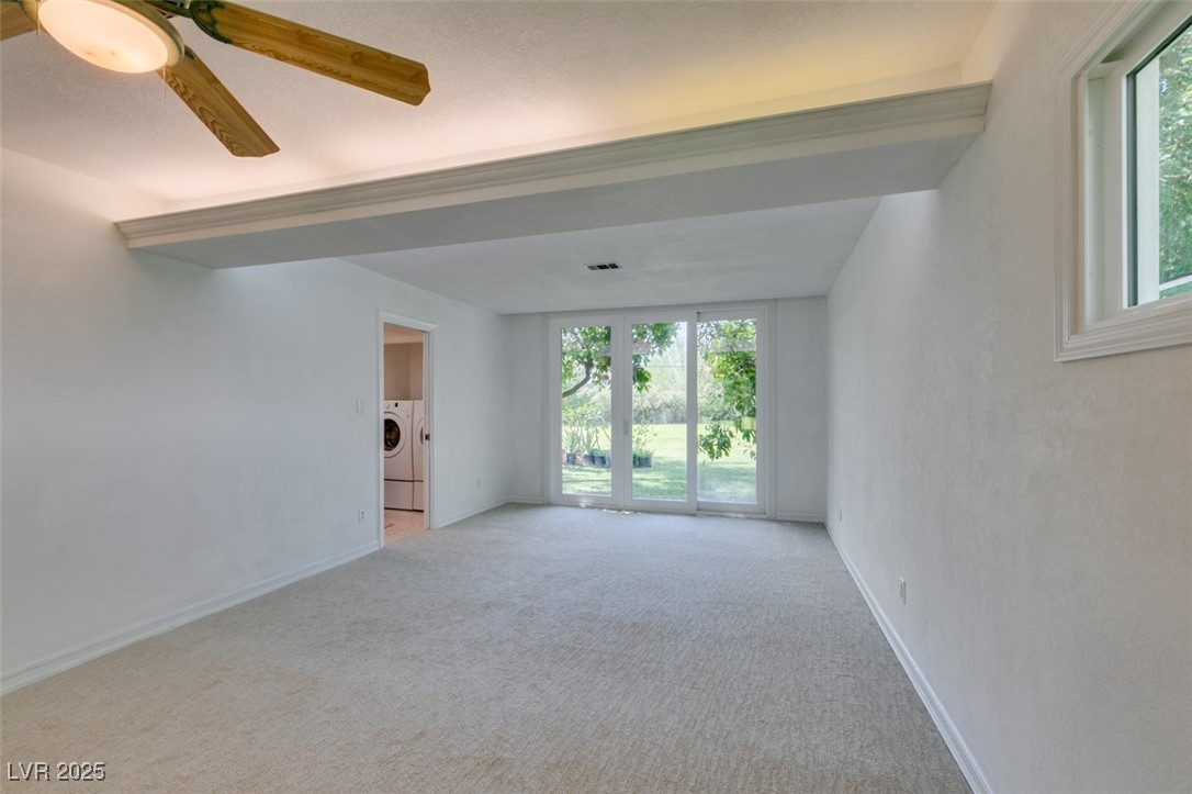 4087 Pleasant Road Las Vegas, NV 89108 - Photo 43 of 74 Carpeted empty room featuring separate washer and dryer and ceiling fan