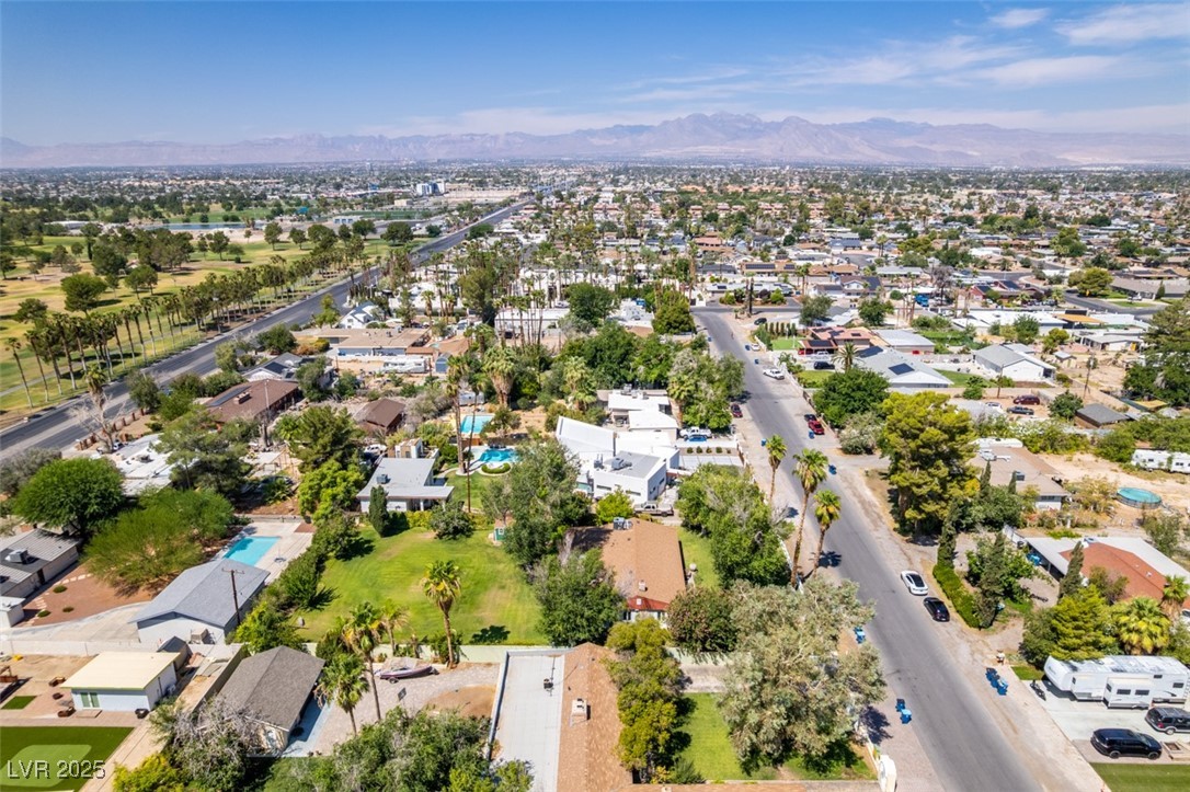 4087 Pleasant Road Las Vegas, NV 89108 - Photo 63 of 74 Aerial view of residential area with a mountain backdrop