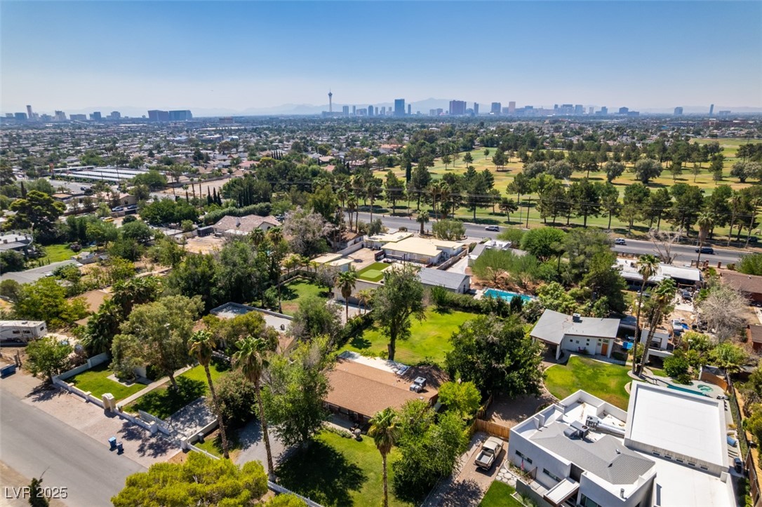 4087 Pleasant Road Las Vegas, NV 89108 - Photo 71 of 74 Aerial perspective of suburban area with skyline