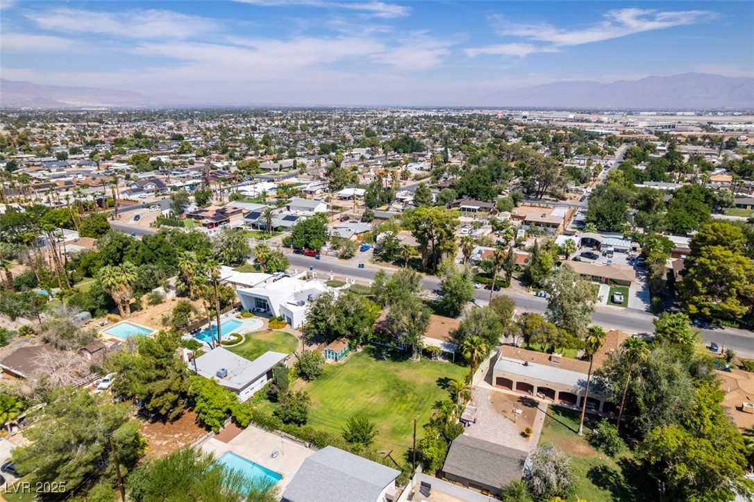 4087 Pleasant Road Las Vegas, NV 89108 - Photo 72 of 74 Aerial perspective of suburban area with mountains