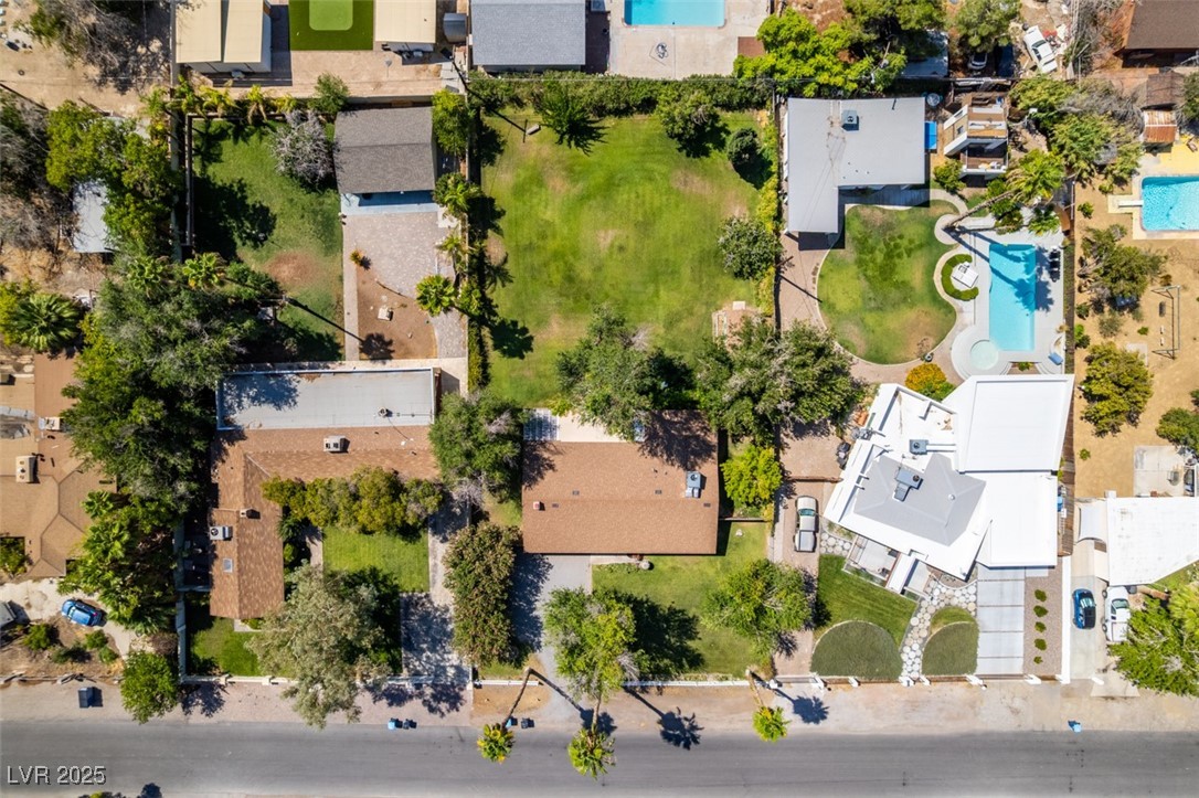 4087 Pleasant Road Las Vegas, NV 89108 - Photo 73 of 74 Aerial perspective of suburban area featuring a pool