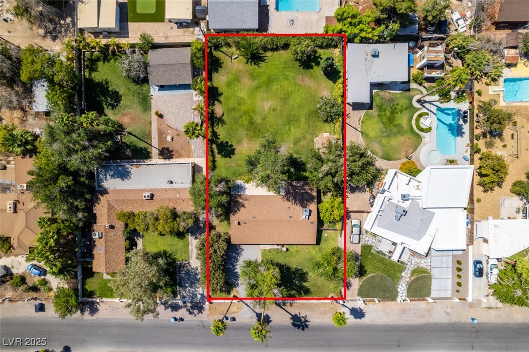4087 Pleasant Road Las Vegas, NV 89108 - Photo 74 of 74 Aerial perspective of suburban area with property parcel outlined