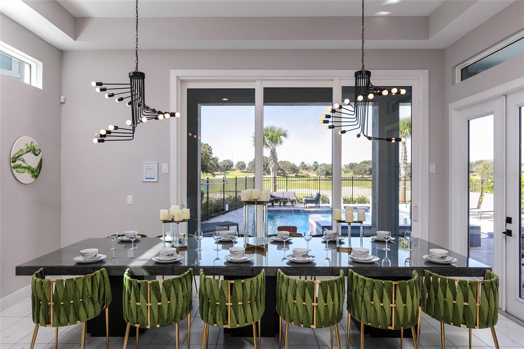1514 Corolla Court Reunion, FL 34747 - Photo 11 of 74 a view of a dining room with furniture window and outside view
