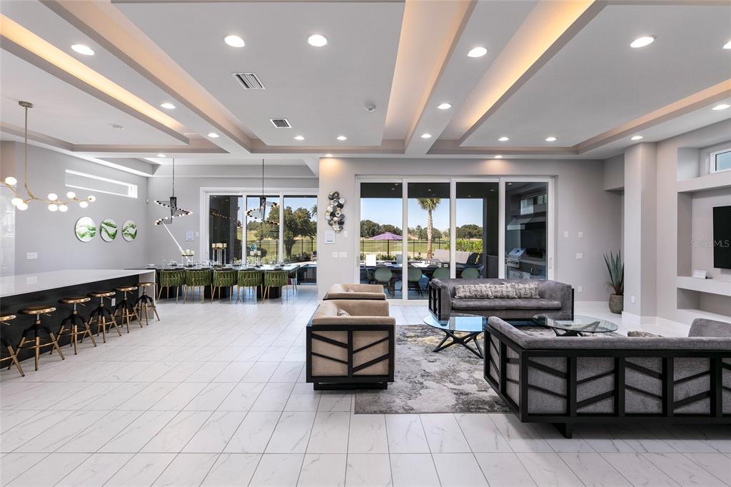 1514 Corolla Court Reunion, FL 34747 - Photo 14 of 74 a lobby with furniture and large windows