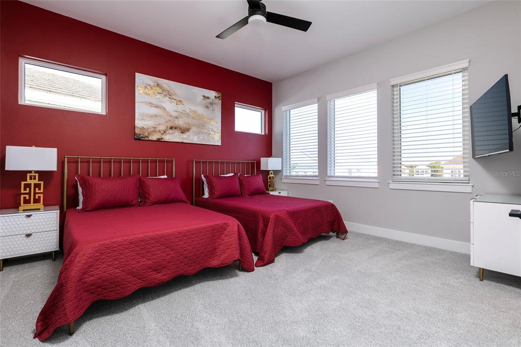 1514 Corolla Court Reunion, FL 34747 - Photo 43 of 74 a bedroom with bed and window