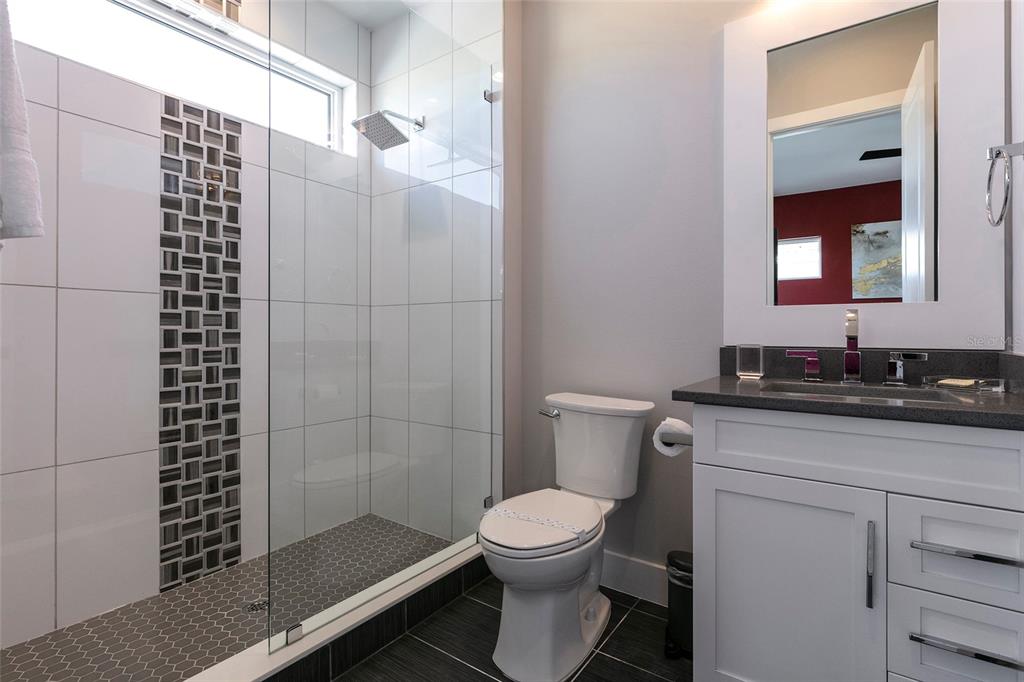 1514 Corolla Court Reunion, FL 34747 - Photo 44 of 74 a bathroom with a sink toilet and shower