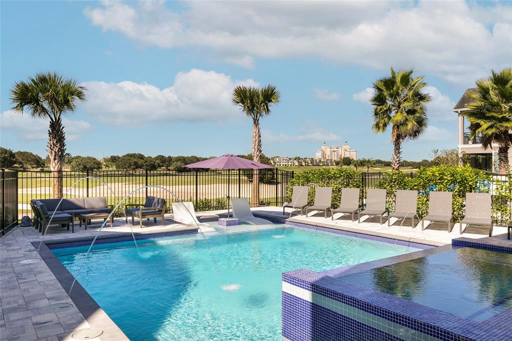 1514 Corolla Court Reunion, FL 34747 - Photo 61 of 74 a view of a lake with lawn chairs
