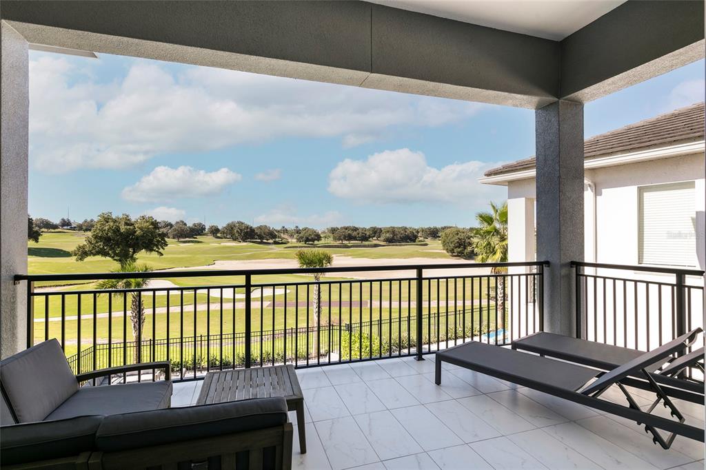 1514 Corolla Court Reunion, FL 34747 - Photo 64 of 74 a view of a balcony with wooden floor