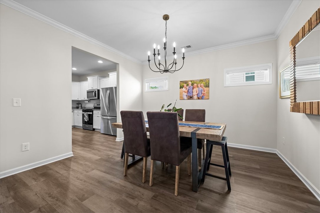 216 Carvel Trail Seneca, SC 29678 - Photo 11 of 48 This inviting dining area seamlessly connects to the kitchen, perfect for entertaining.