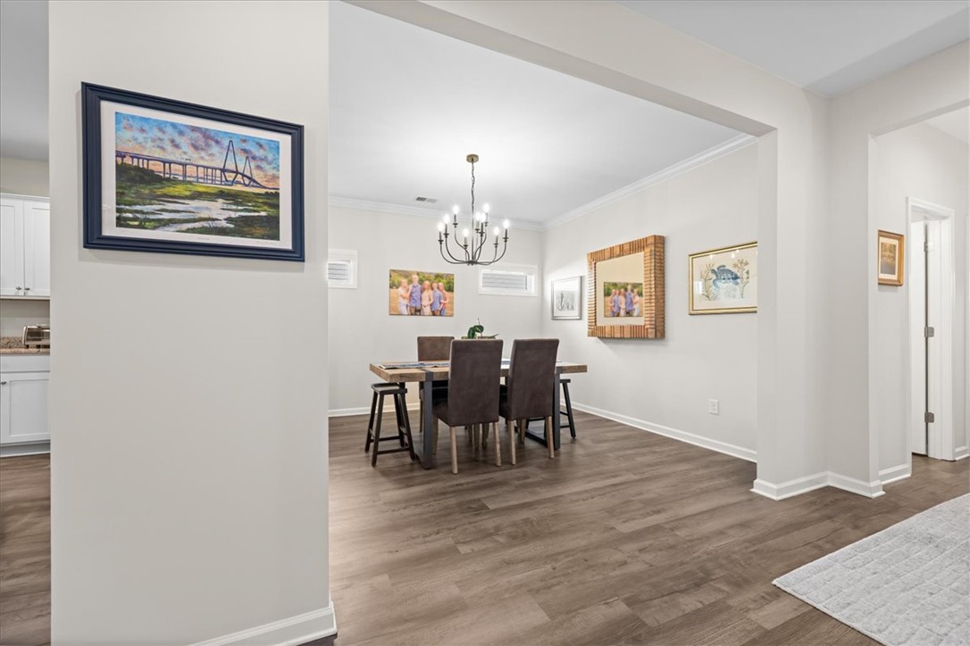 216 Carvel Trail Seneca, SC 29678 - Photo 13 of 48 This dining area features elegant flooring and lighting, ideal for gatherings.