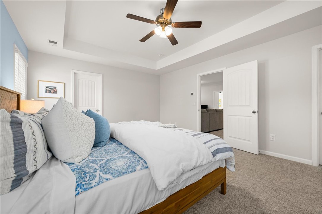 216 Carvel Trail Seneca, SC 29678 - Photo 27 of 48 This spacious bedroom offers comfortable living with elegant architectural details.
