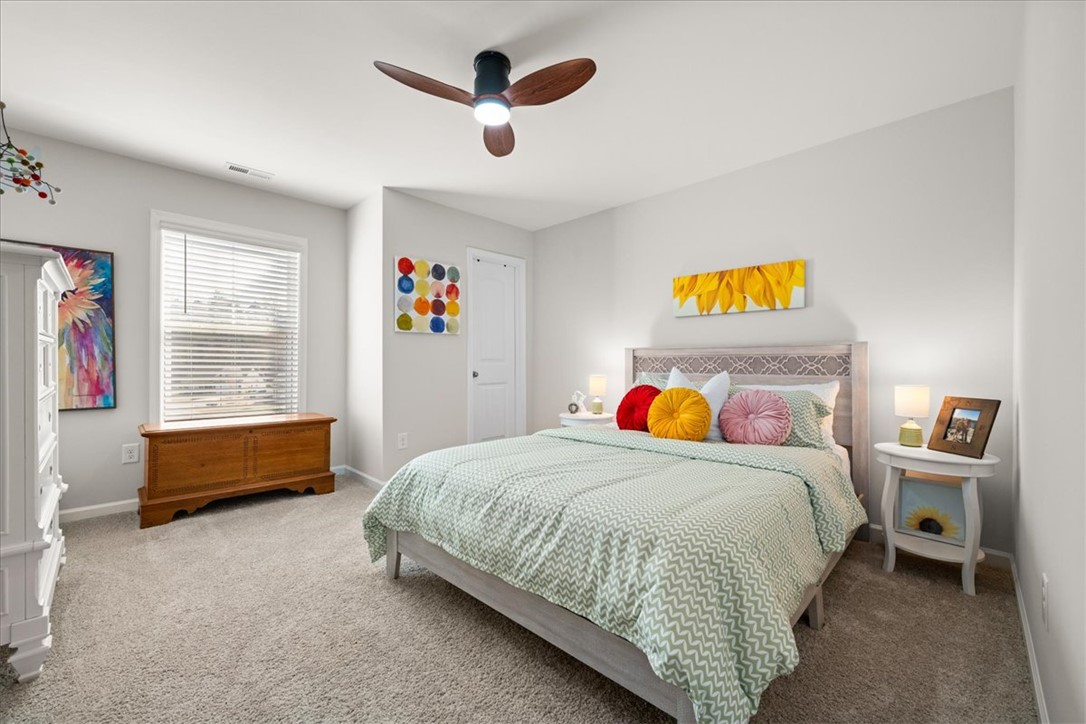 216 Carvel Trail Seneca, SC 29678 - Photo 34 of 48 This cozy bedroom offers a tranquil retreat with soft textures and ample natural light.