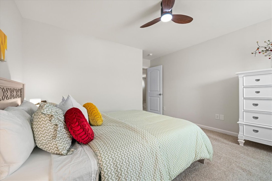 216 Carvel Trail Seneca, SC 29678 - Photo 35 of 48 This cozy bedroom offers comfort and a tranquil escape.
