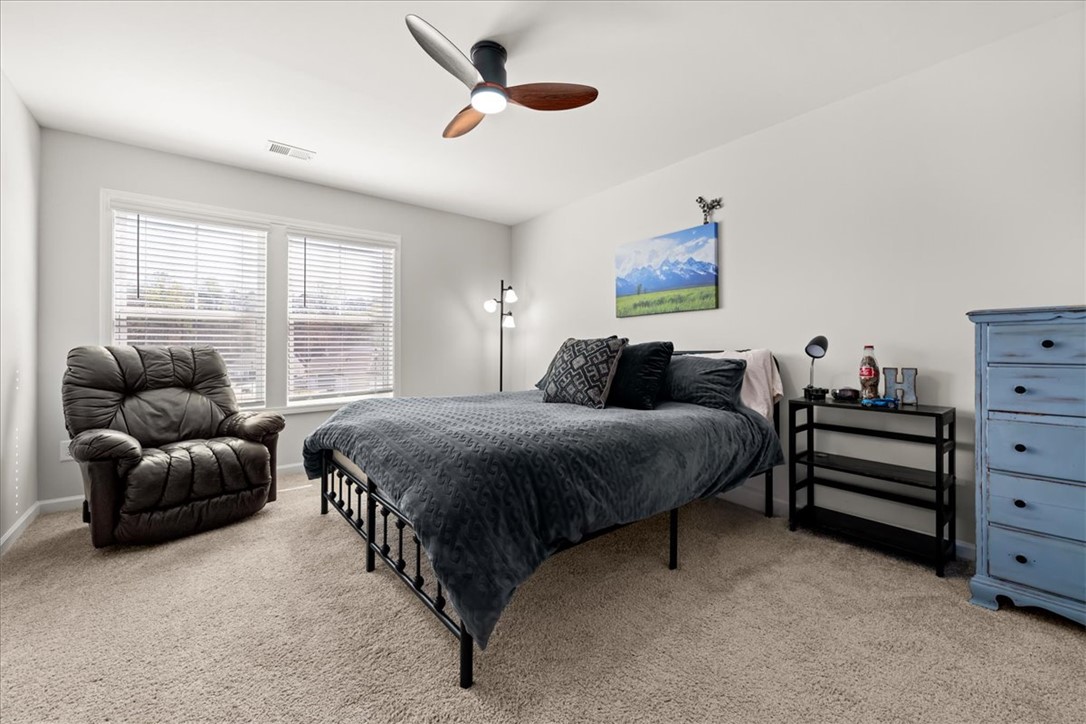 216 Carvel Trail Seneca, SC 29678 - Photo 39 of 48 This cozy bedroom offers a serene retreat with a comfortable layout and ample natural light.