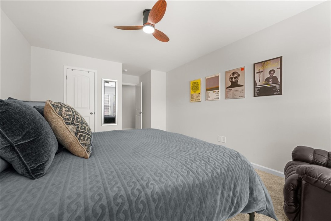216 Carvel Trail Seneca, SC 29678 - Photo 40 of 48 This spacious bedroom offers comfortable living with soft carpeting and ample natural light.