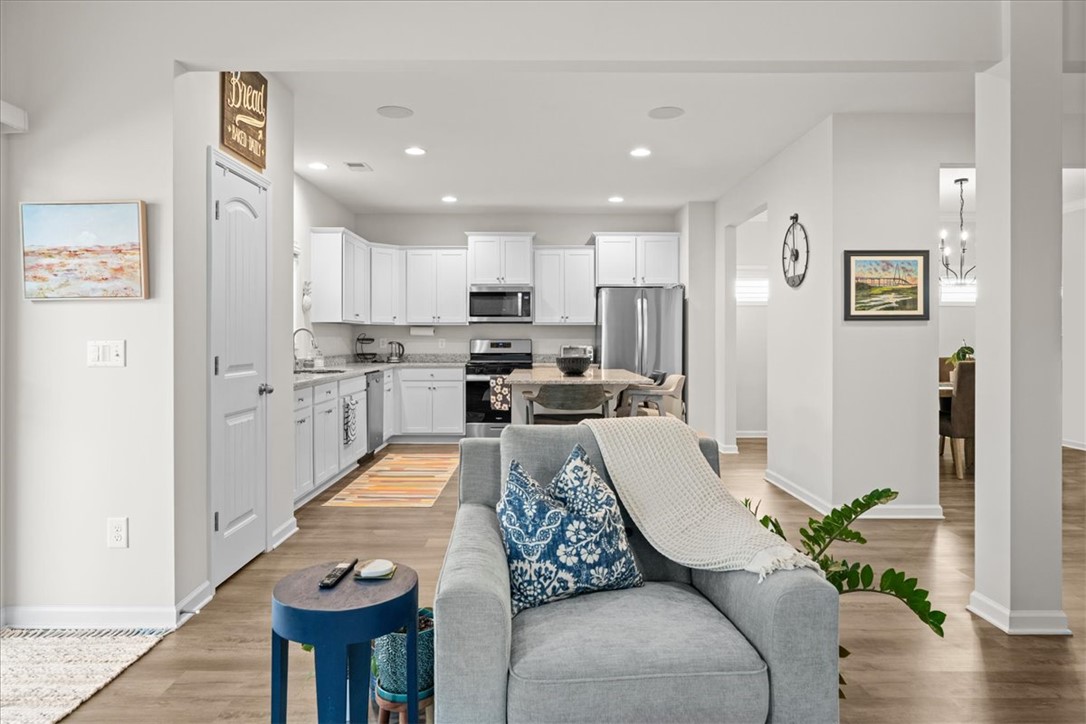 216 Carvel Trail Seneca, SC 29678 - Photo 8 of 48 This inviting space combines comfort and culinary convenience in a seamless, open design.