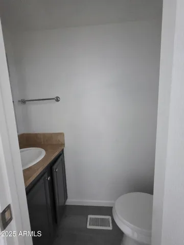 a bathroom with a sink and a toilet