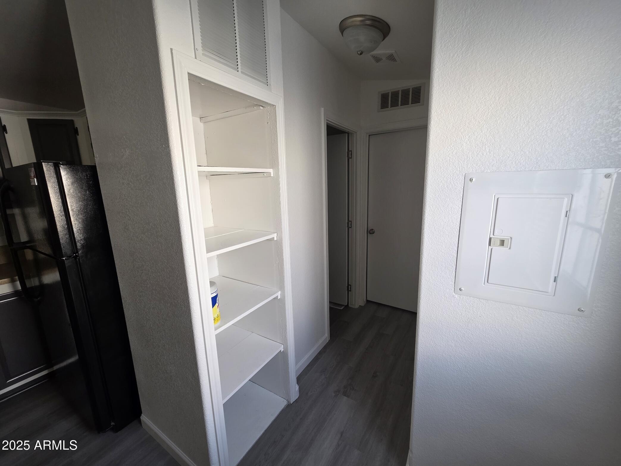 7807 East Main Street, Unit C6 Mesa, AZ 85207 - Photo 8 of 32 a view of hallway with wooden floor