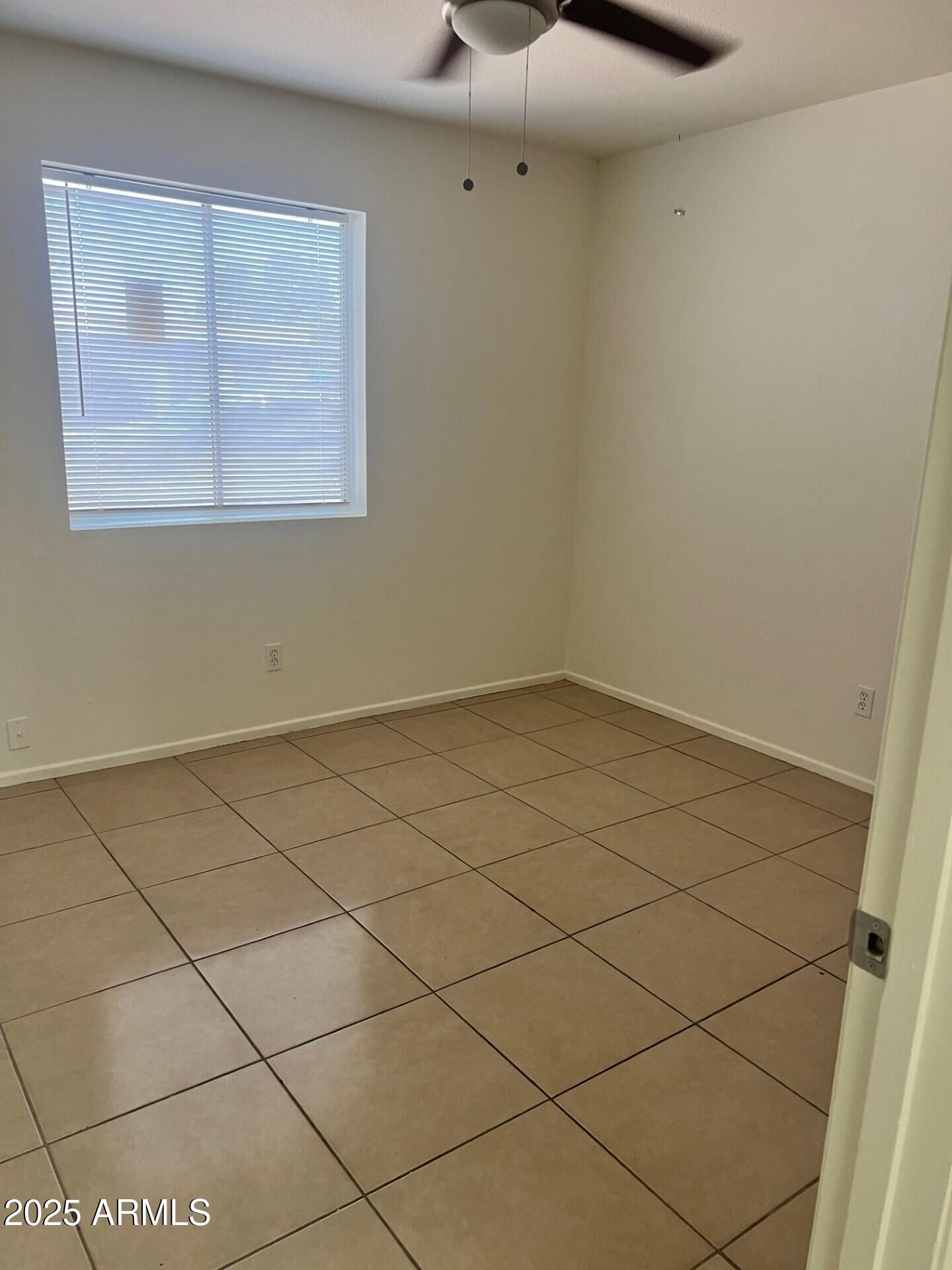 540 North Hall Mesa, AZ 85203 - Photo 6 of 9 a view of a room that has a window in it