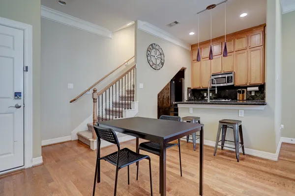 a view of a dining room with furniture