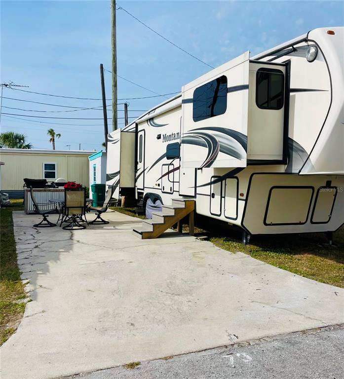 73 Main Street Palmetto, FL 34221 - Photo 2 of 18 a view of a street with furniture