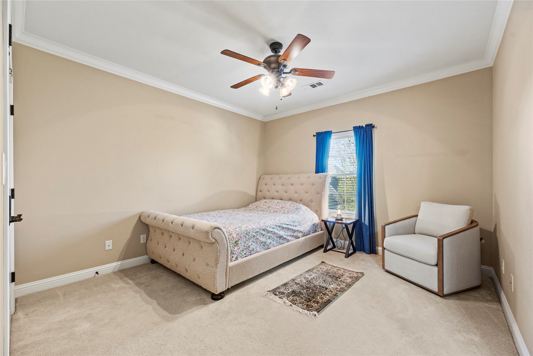 3550 Windrose Drive Beaumont, TX 77706 - Photo 42 of 50 Bright secondary bedroom with crown molding and neutral tones, also connected to the Jack & Jill bath.