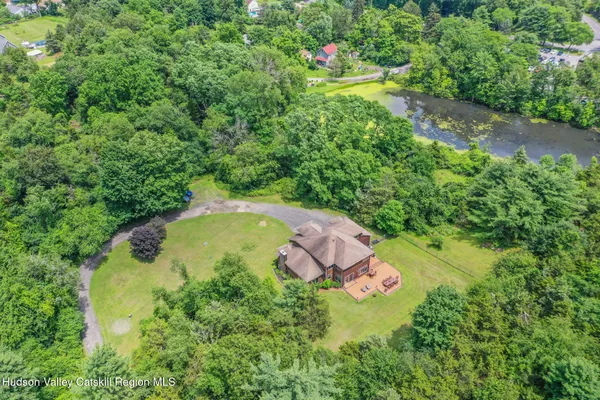 a view of a lake with a tree