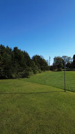 a view of grassy field with grass