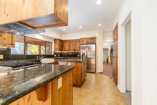 a bathroom with a shower and a toilet