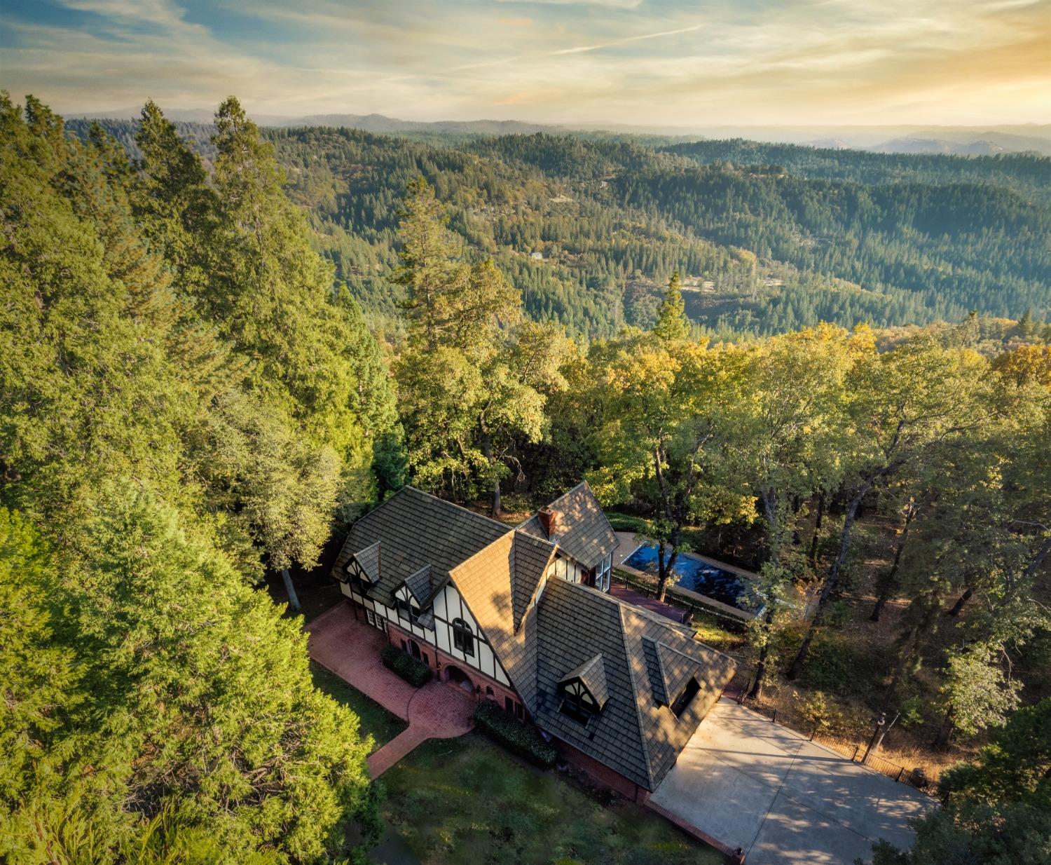 3961 7 Ridges Road Camino, CA 95709 - Photo 4 of 93 an aerial view of a house with a lake view