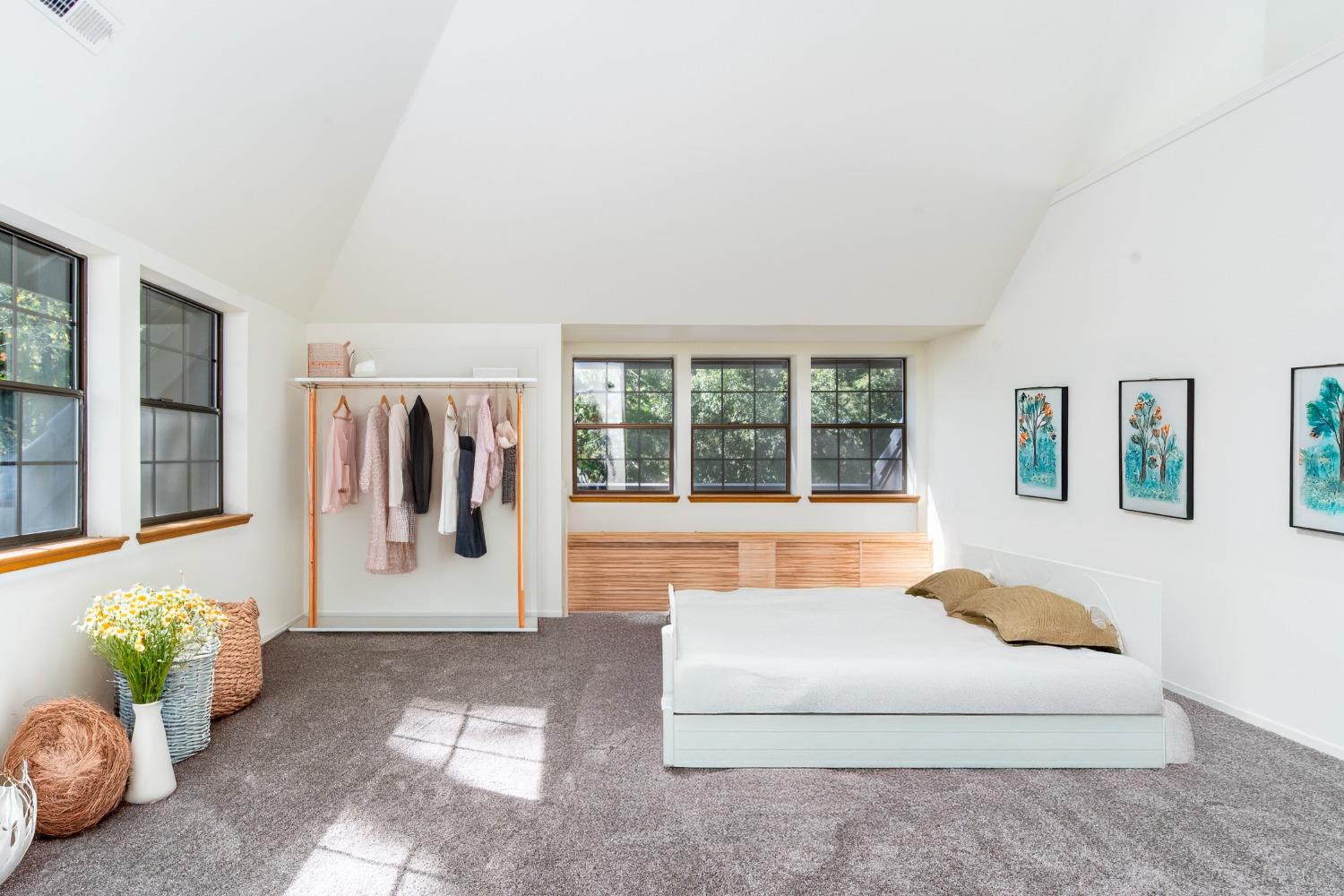 3961 7 Ridges Road Camino, CA 95709 - Photo 52 of 93 a spacious bedroom with a bed and glass window