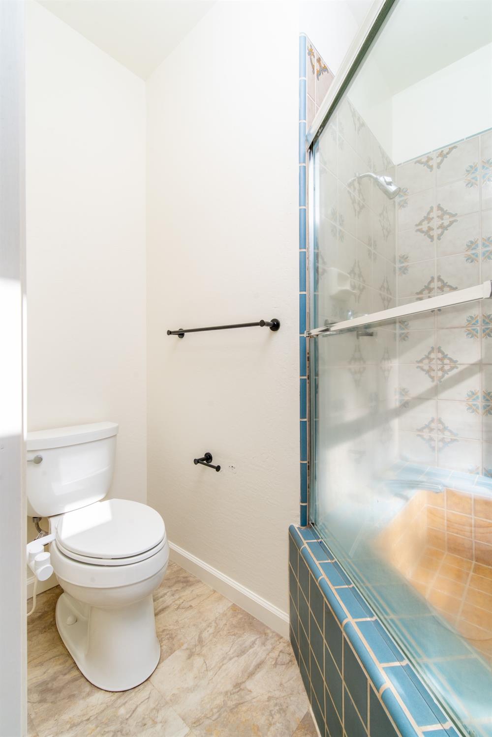 3961 7 Ridges Road Camino, CA 95709 - Photo 56 of 93 a bathroom with a toilet and a shower