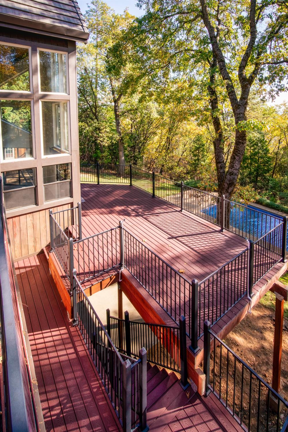 3961 7 Ridges Road Camino, CA 95709 - Photo 63 of 93 a view of a roof deck with wooden floor and fence