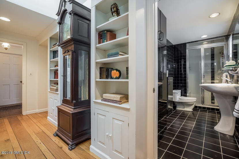 194 Bedford Road Greenwich, CT 06831 - Photo 15 of 44 a bathroom with a sink toilet and shower