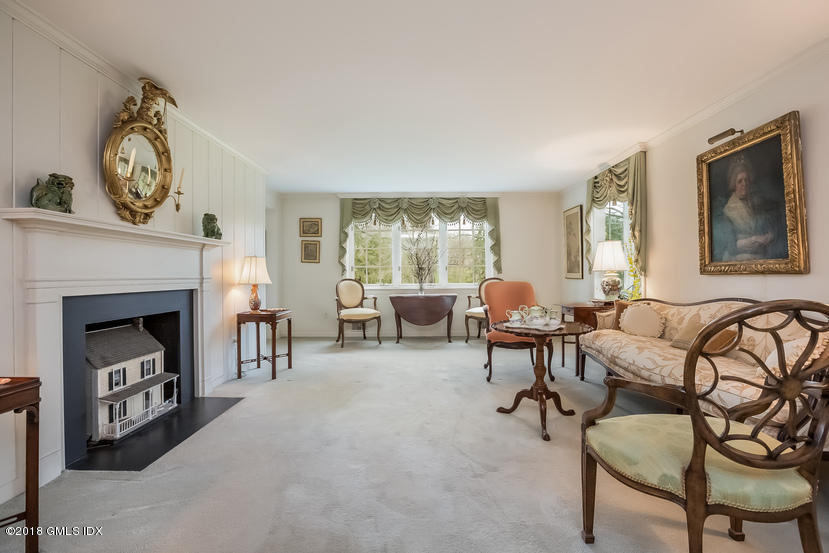 194 Bedford Road Greenwich, CT 06831 - Photo 7 of 44 a living room with furniture and a fireplace