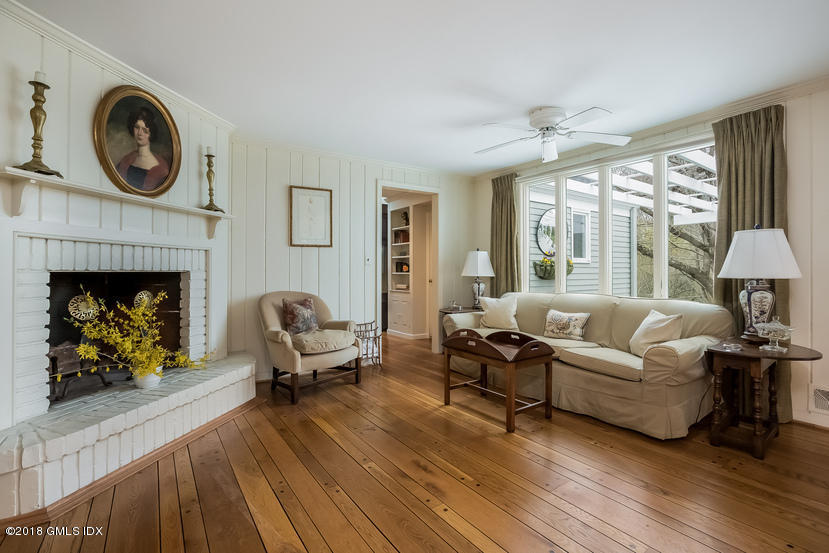 194 Bedford Road Greenwich, CT 06831 - Photo 8 of 44 a living room with furniture and a fireplace