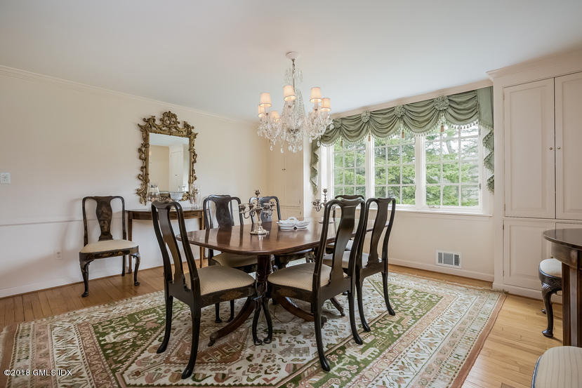 194 Bedford Road Greenwich, CT 06831 - Photo 9 of 44 a view of a dining room with furniture window and wooden floor