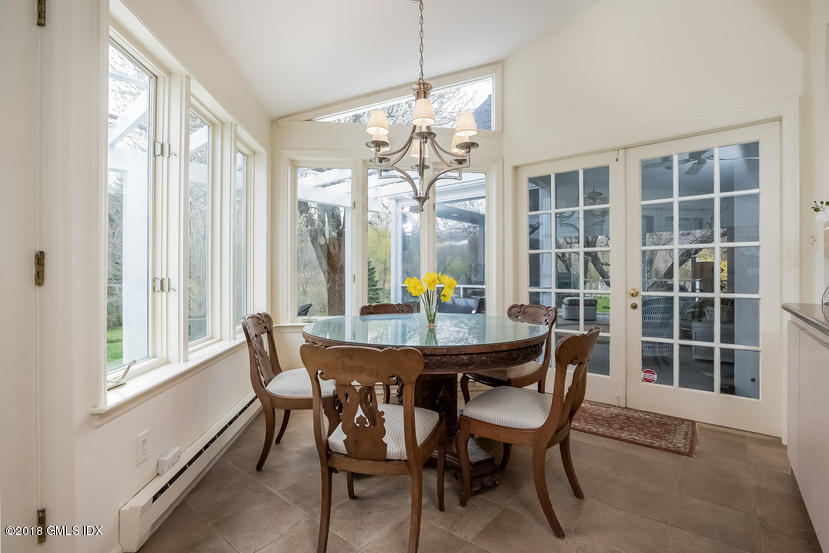 194 Bedford Road Greenwich, CT 06831 - Photo 10 of 44 a view of a dining room with furniture window and outside view