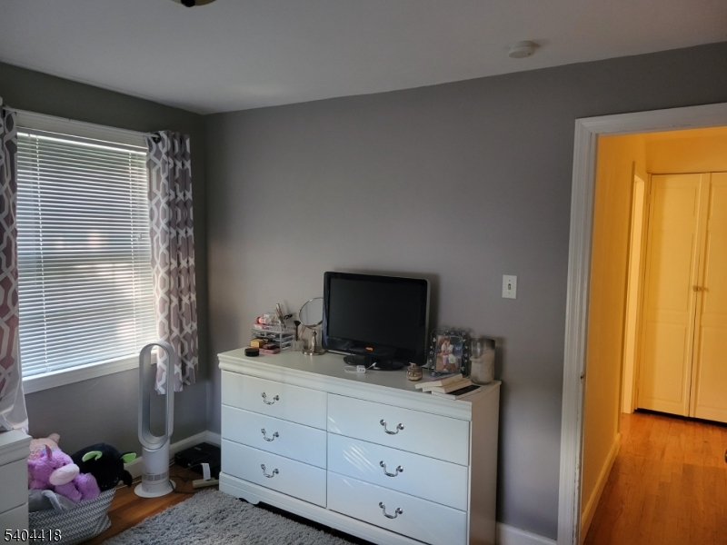 8 Randolph Avenue Hopatcong, NJ 07843 - Photo 11 of 30 a bathroom with a sink toilet and mirror