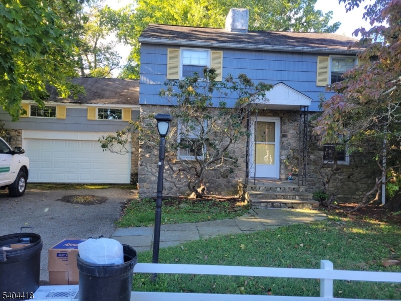8 Randolph Avenue Hopatcong, NJ 07843 - Photo 2 of 30 a front view of a house with garden