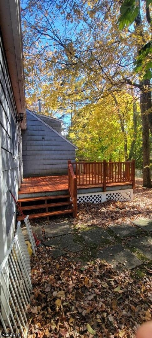 8 Randolph Avenue Hopatcong, NJ 07843 - Photo 29 of 30 a backyard of a house with a shaded area