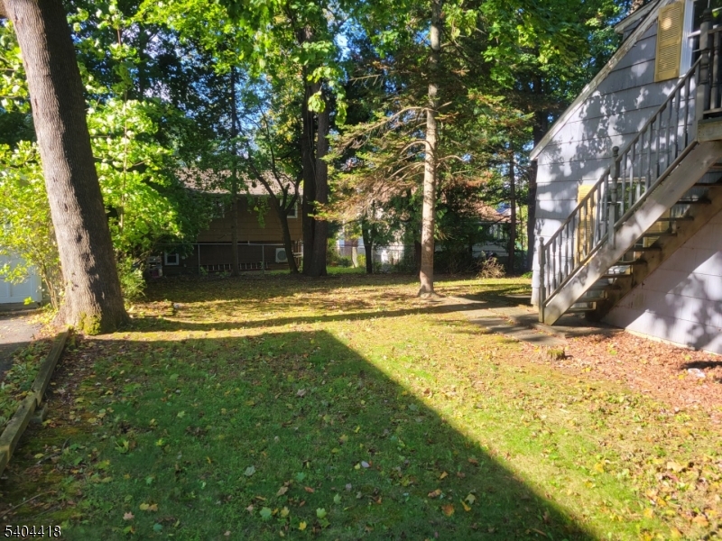 8 Randolph Avenue Hopatcong, NJ 07843 - Photo 4 of 30 a view of a swimming pool with an outdoor space