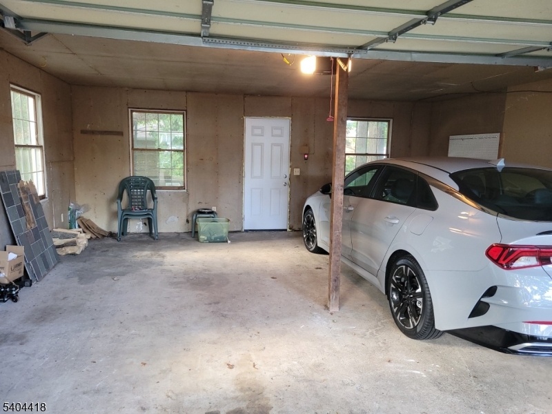 8 Randolph Avenue Hopatcong, NJ 07843 - Photo 9 of 30 a view of a livingroom with furniture and windows