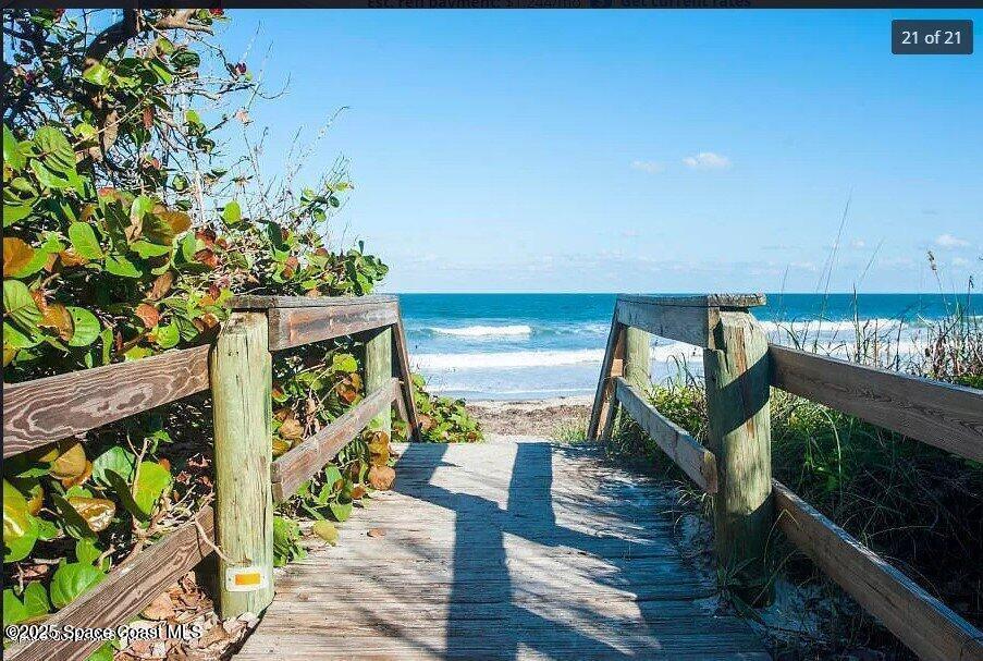 142 Atlantic Avenue Indialantic, FL 32903 - Photo 28 of 28 a balcony with wooden floor