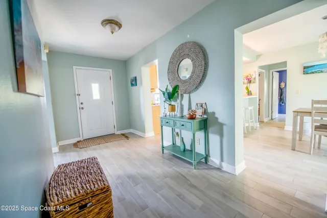 a view of livingroom with furniture and wooden floor