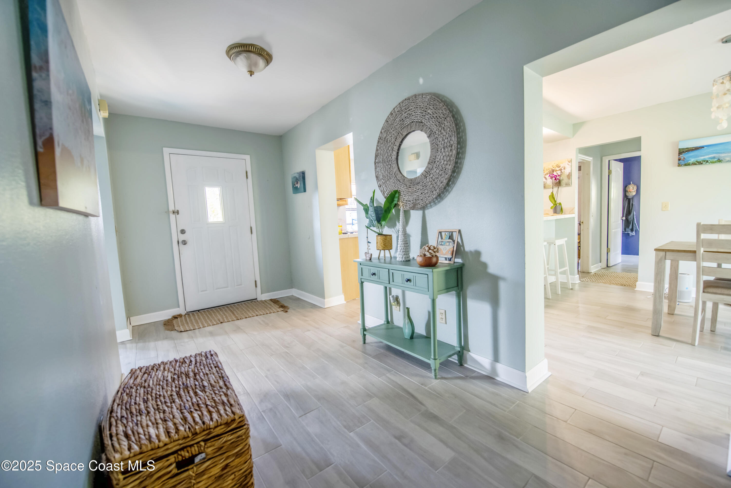 142 Atlantic Avenue Indialantic, FL 32903 - Photo 5 of 28 a view of livingroom with furniture and wooden floor