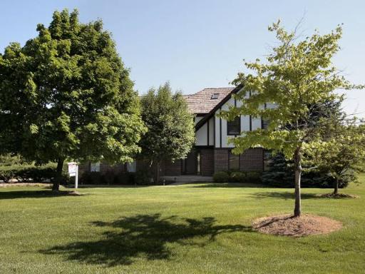 2217 Shetland Road Inverness, IL 60010 - Photo 1 of 1 a view of a tree in front of a house
