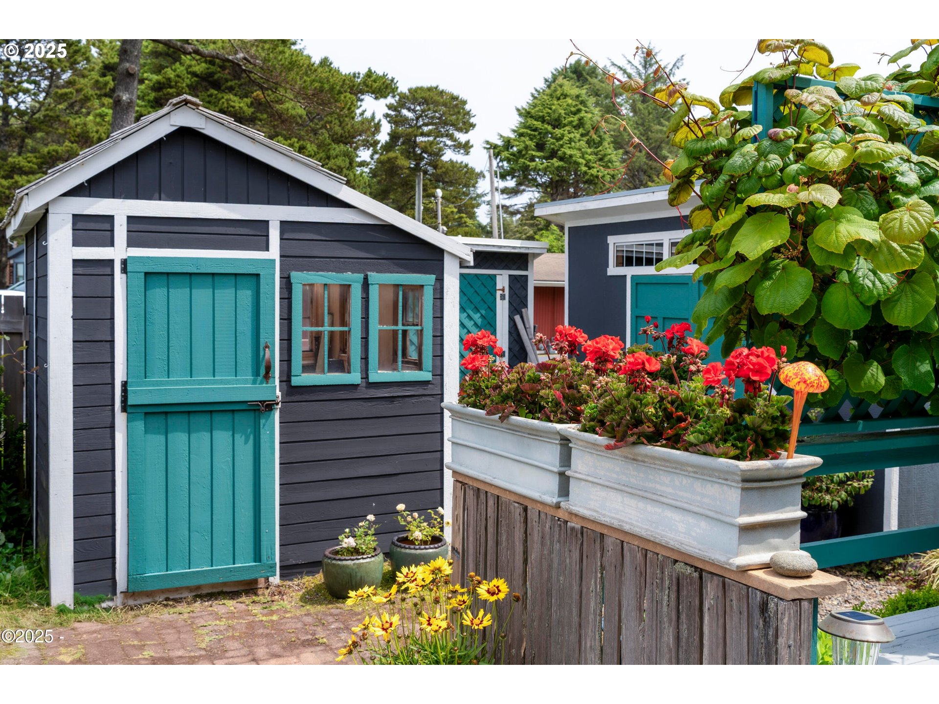 4875 Highway 101, Unit 11 Depoe Bay, OR 97341 - Photo 22 of 32 a front view of a house with a yard